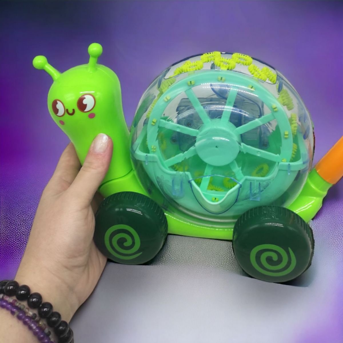 Іграшка "Равлик" 2 в 1: установка з мильними бульбашками та каталка (зелена)