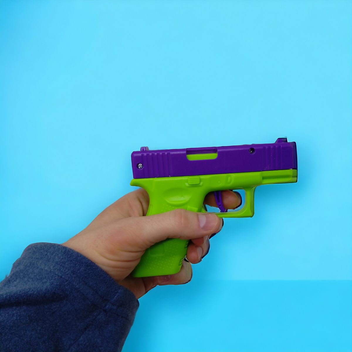 Пистолет-антистресс пластиковый (10 см)