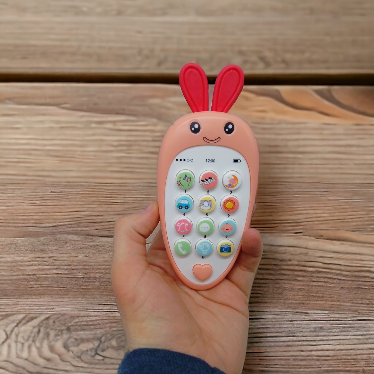 Розвиваюча іграшка "Морковка-телефон" (рожева)