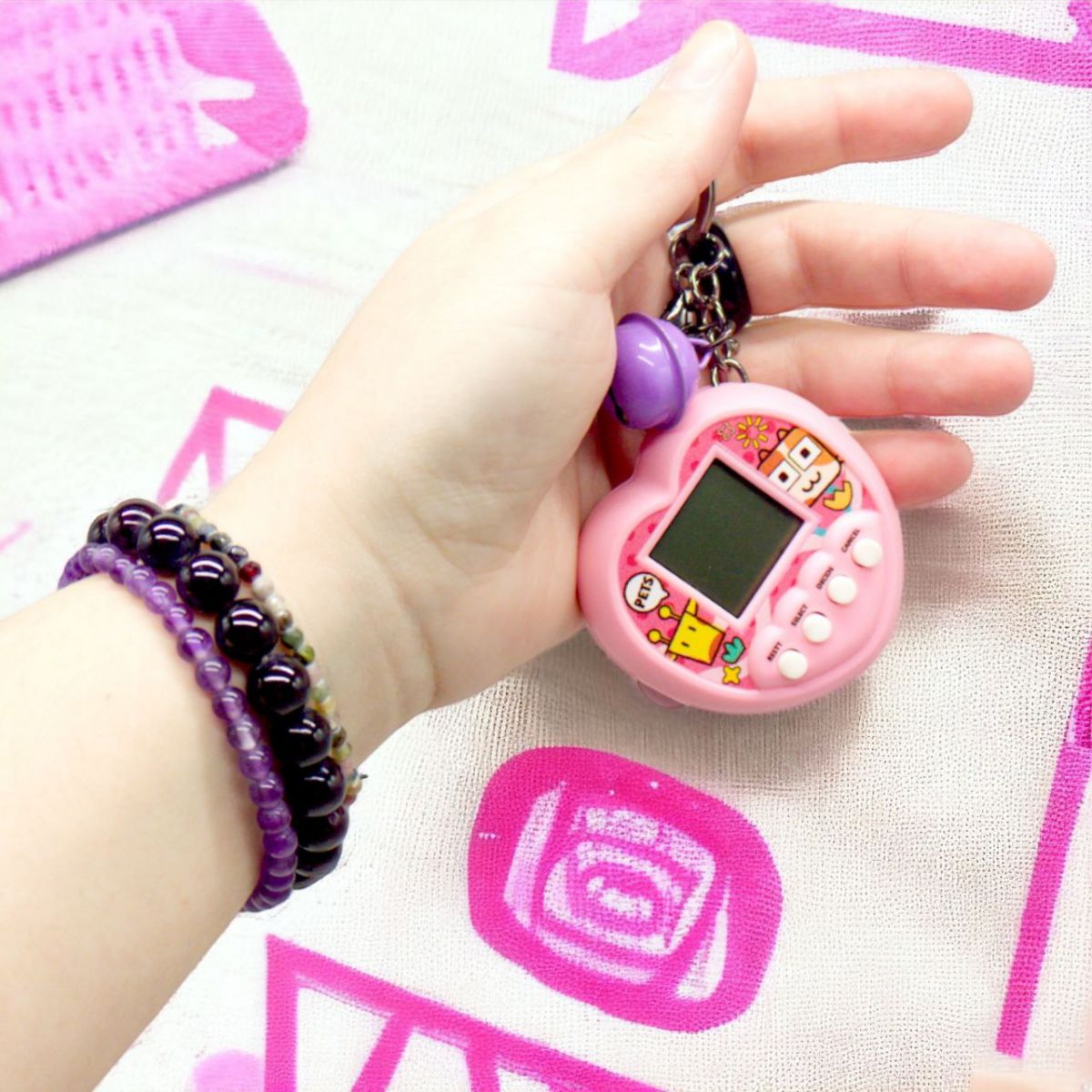 Электронная игра-брелок "Тамагочи: Pet Egg Game" (розовая)