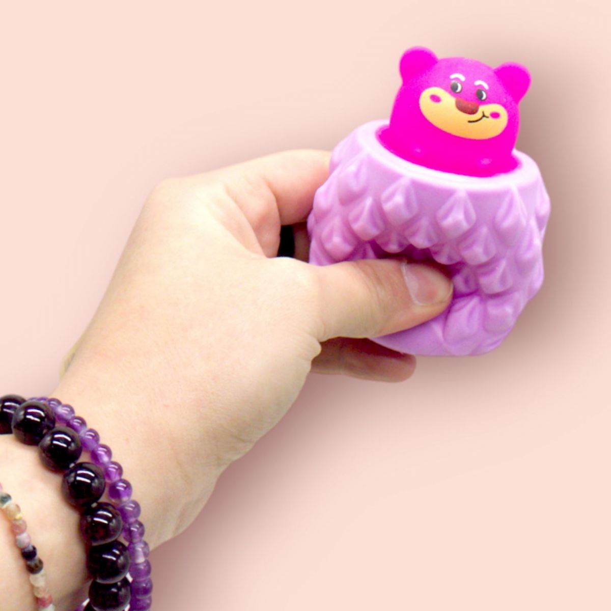 Игрушка антистресс "Мишка в ананасе", фиолетовый