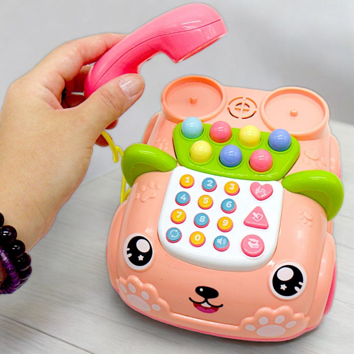 Интерактивная игрушка "Телефончик на колесах", розовый