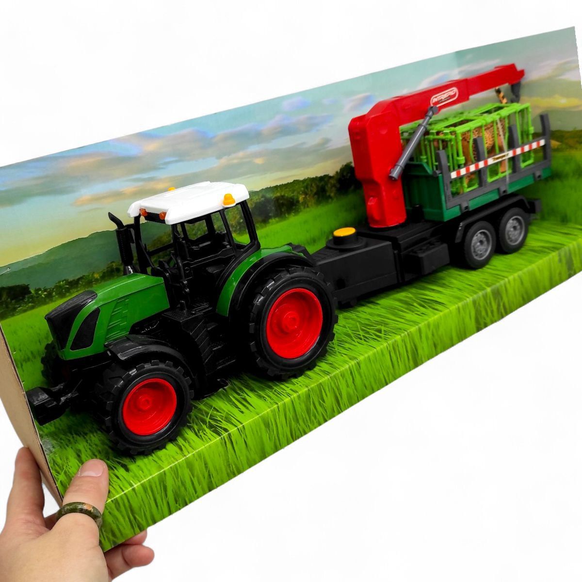 Трактор іграшковий (довжина з причепом 49 см, рухомі елементи, інерція, причіп, 2 фігурки тварин) в коробці - 53х16х22 см  фото 2