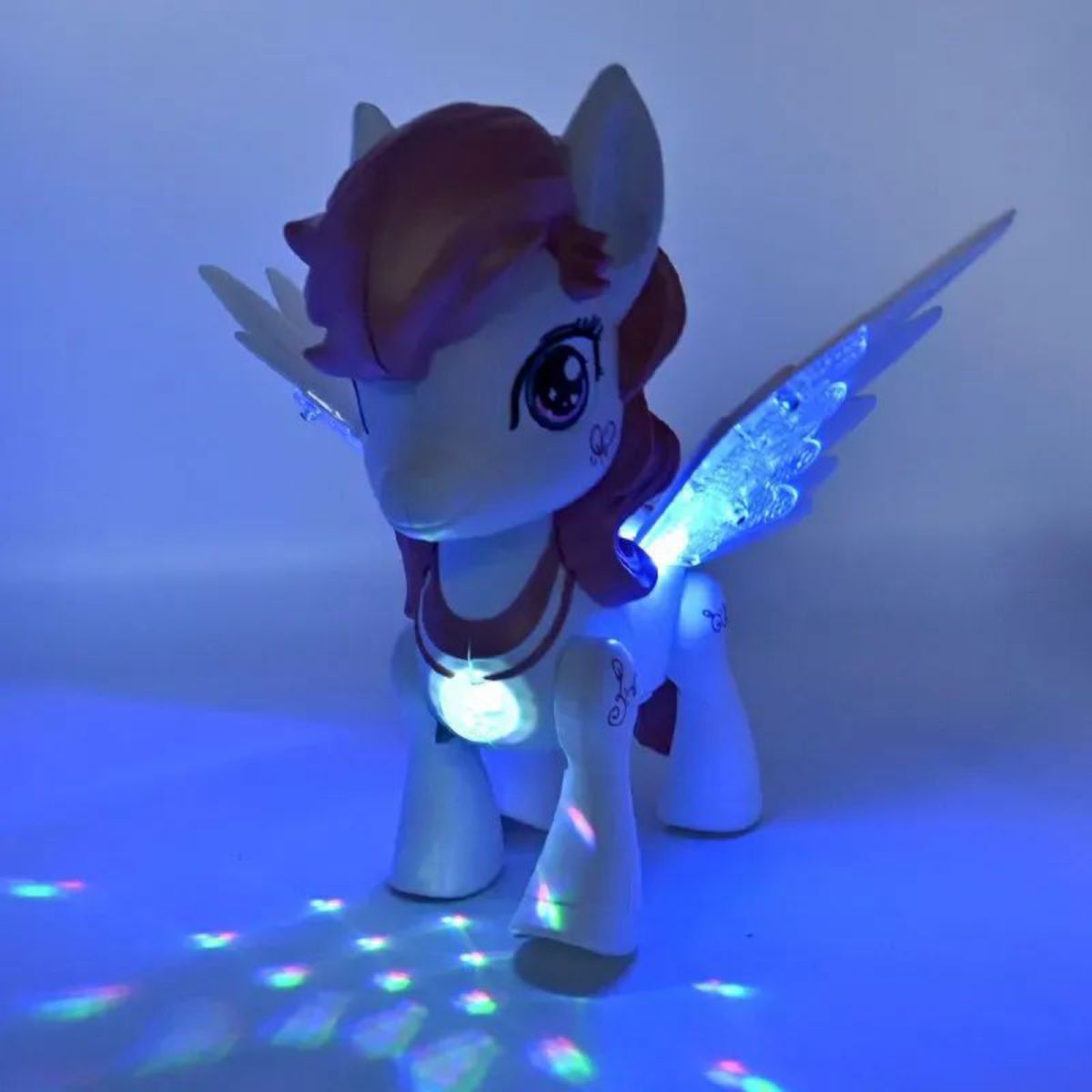 Музична іграшка “Поні”, підсвічування, пісня англ.  мовою, проєктор, ходить, в коробці (Бірюзова)  фото 2