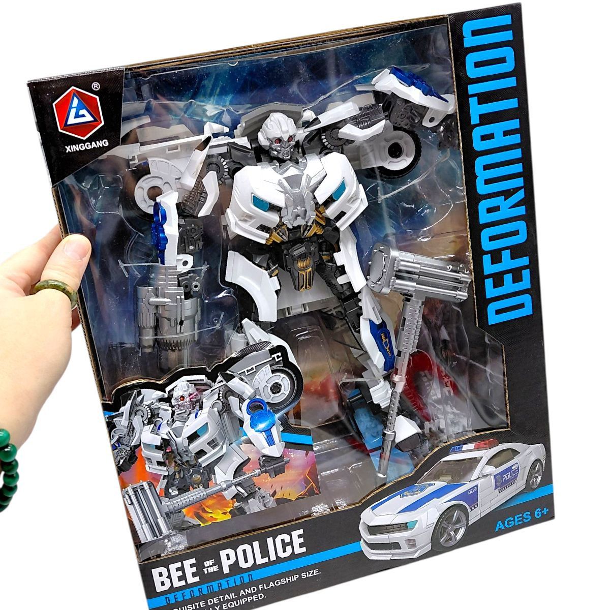 Трансформер (металеві елементи, зброя, інструкція) коробка  фото 2