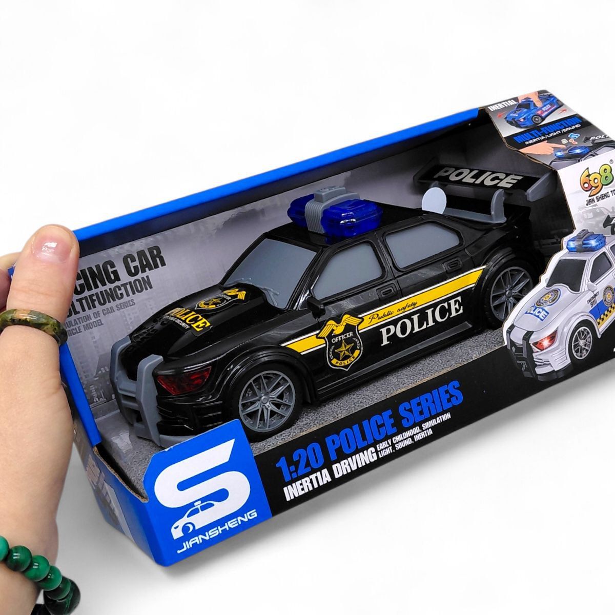 Машина инерционная "Полиция", озвученная, со светом (в коробке р. 24x12x11 см)  фото 2