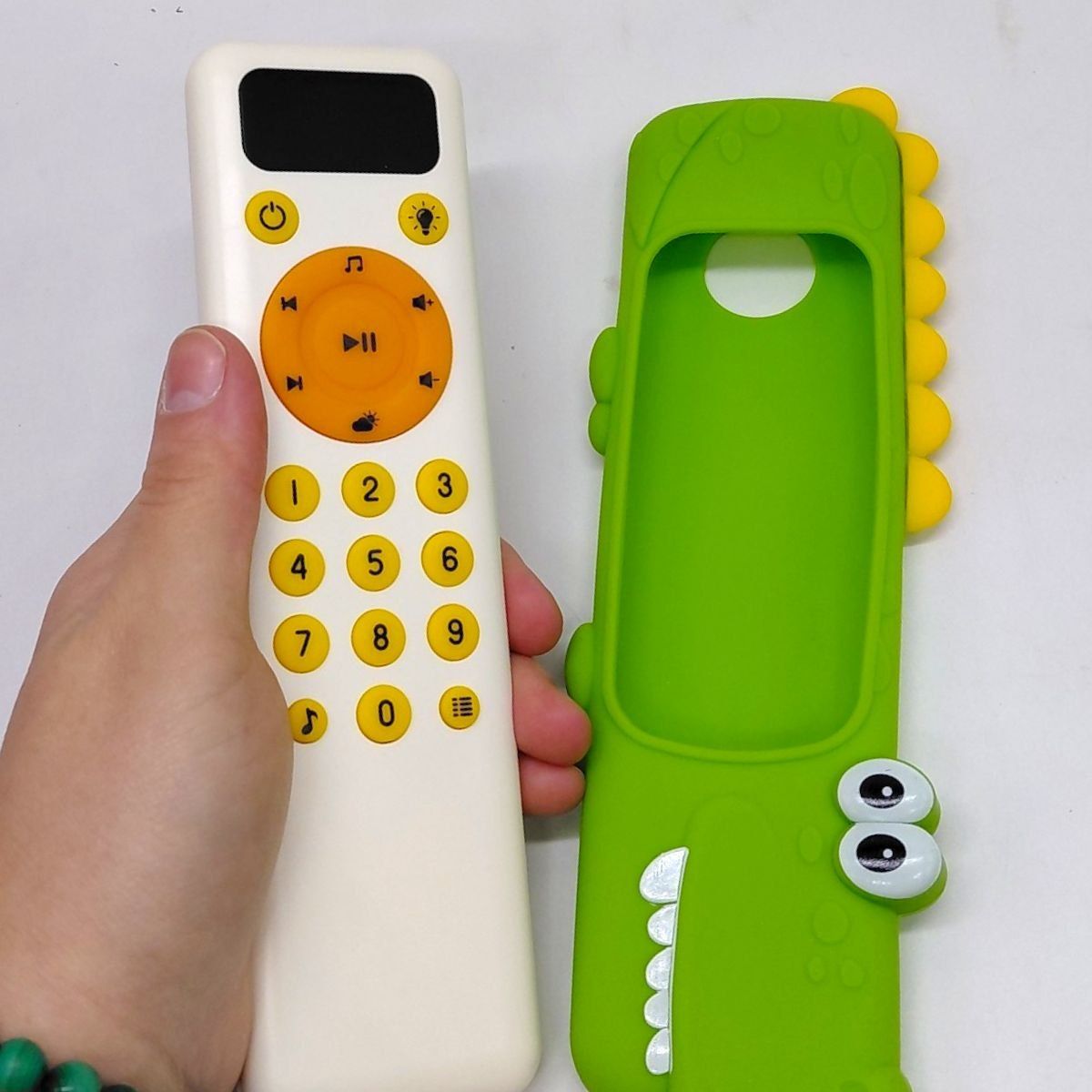 Пульт подсветки (мелодии, звуки погоды и животных, цифры, слова, звучание на английском языке, регулировка громкости, резиновый чехол) ЗАЯЦ  фото 2