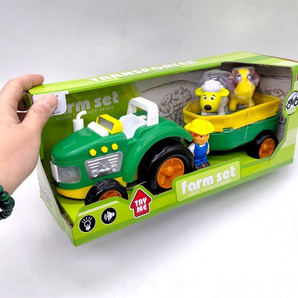 Трактор, підсвічування, звуки, 3 фігурки, в коробці  фото 2