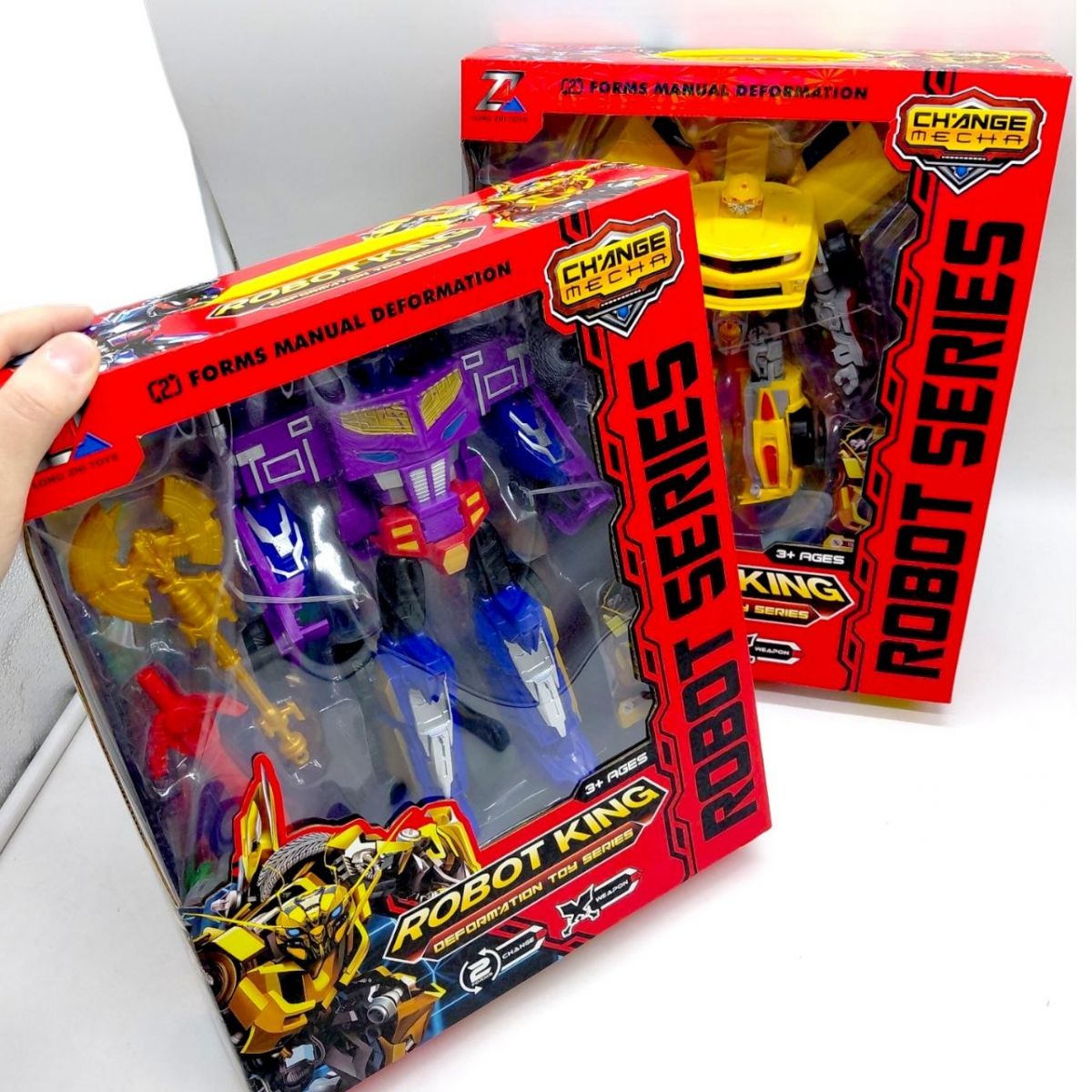 Трансформер, конечности вращающиеся, оружие, пластиковые колеса, в коробке (ЖЕЛТЫЙ)  фото 2