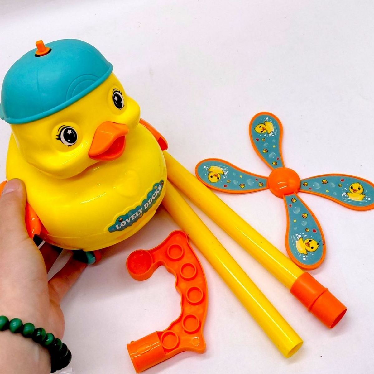 Каталка "Утенок" с ручкой (пакет 21*18*19 см)  фото 2