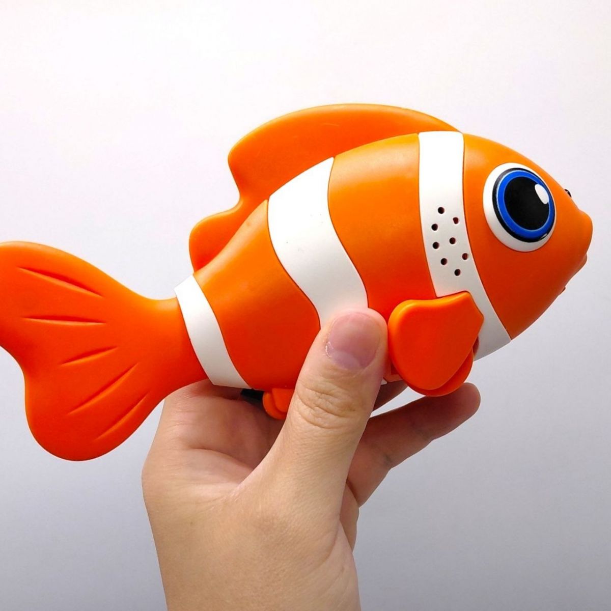 Іграшка "Музична рибка" підсвічування, звуки, мелодії, повторюшка, уникає перешкод, 2 режими, вбудований акумулятор, на листі (ПОМАРАНЧЕВИЙ)  фото 2