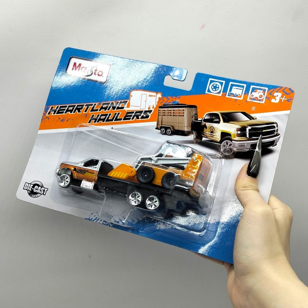 Набір FM Heartland Haulers машинка + причіп (ПОМАРАНЧЕВИЙ)  фото 2