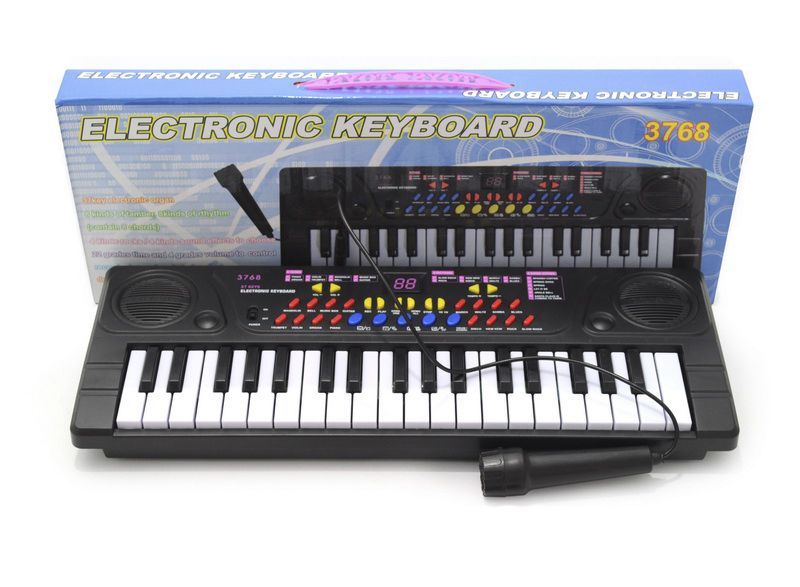 Уцінка.  Піаніно з мікрофоном (37 клавіш) - не всі кнопки та клавіші працюють та тріщина пластику збоку