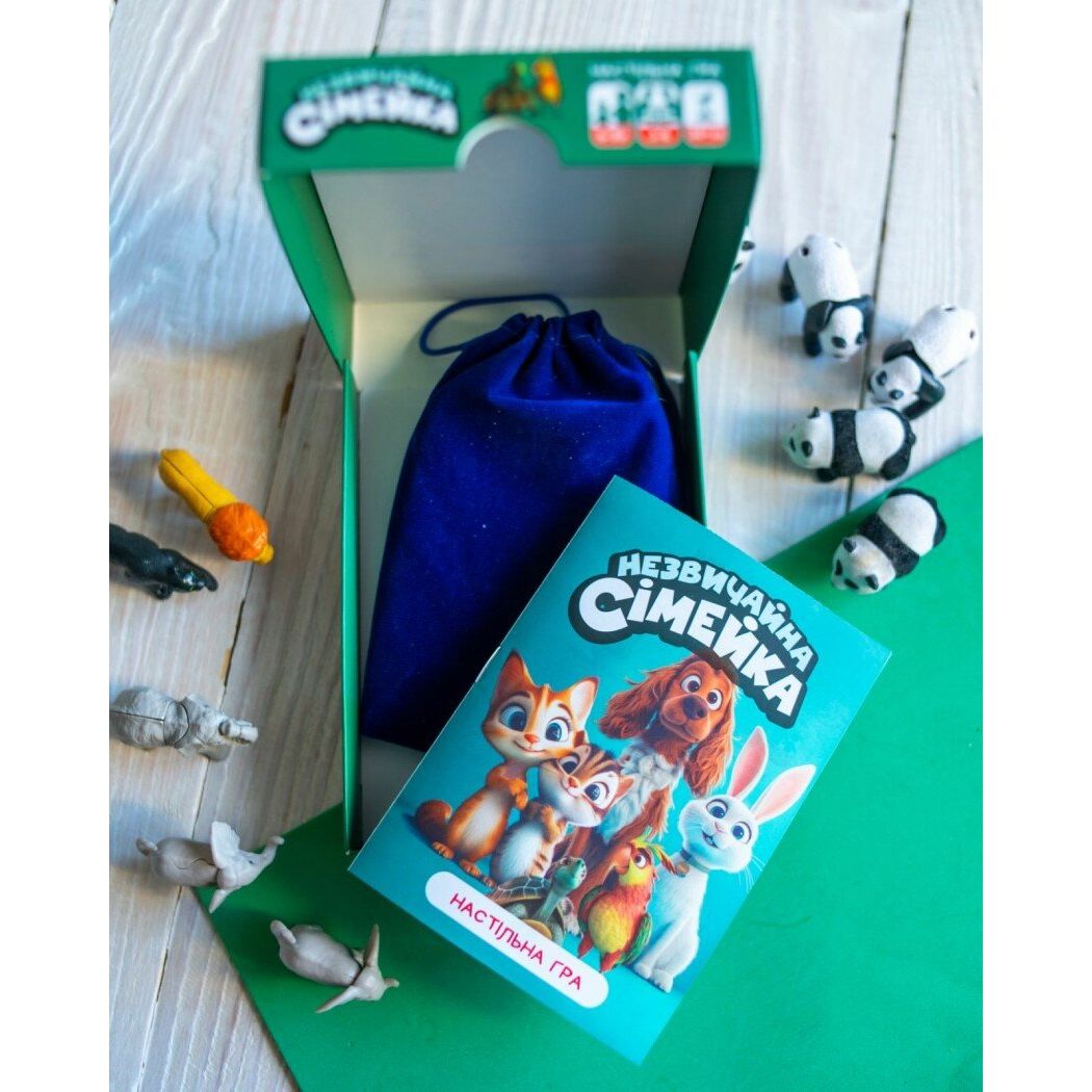 Настільна гра "Незвичайна сімейка" (укр)  фото 3 Настільна гра "Незвичайна сімейка" (укр)  фото 3