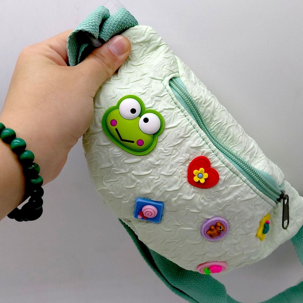 Дитяча напоясна сумочка "Sanrio" одне відділення, в пакеті (ЗЕЛЕНА)  фото 3