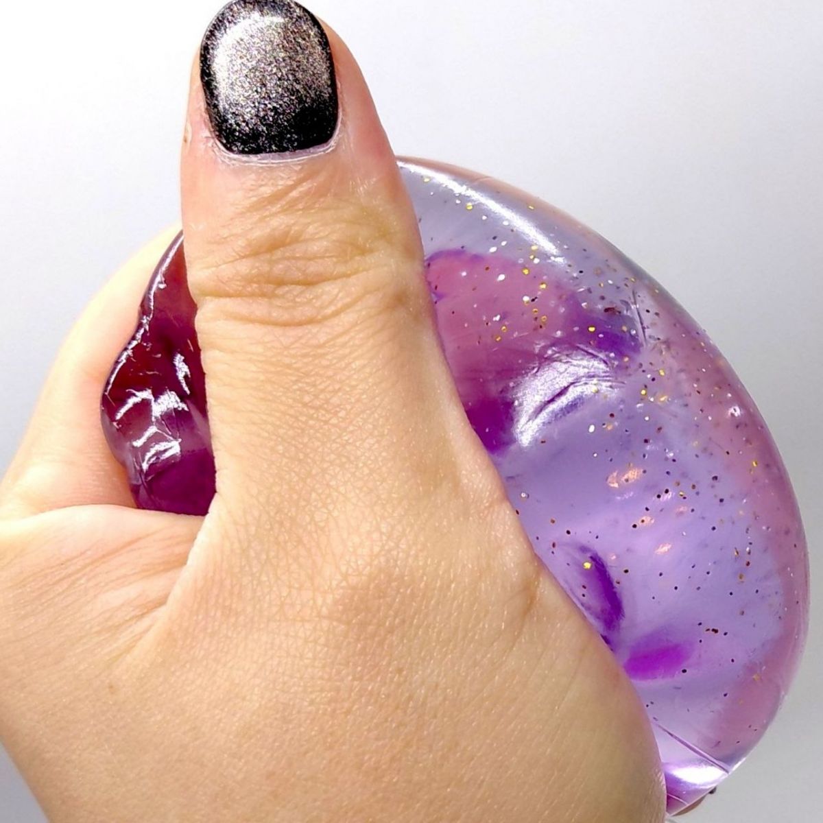 Іграшка-антистресс "Медуза" NeeDoh Jelly Squish Glow, 10 см (БУЗКОВИЙ)  фото 3