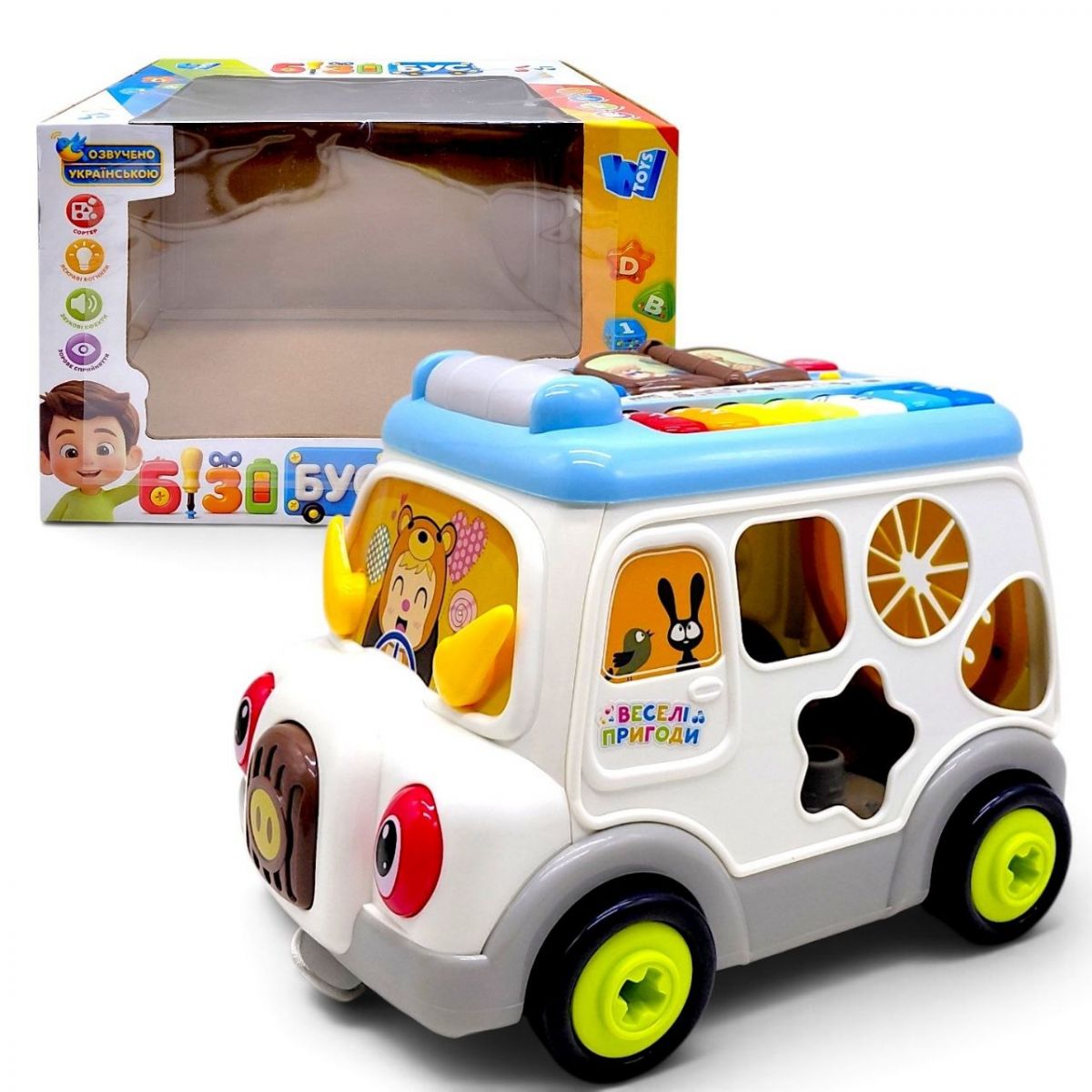 Музичний бізібус 45585 (12) “WToys”, 2 види, ОЗВУЧУВАННЯ УКРАЇНСЬКОЮ МОВОЮ, каталка, підсвічування, пісні, ноти, мелодії, кілька режимів, сортер, шестерні, тріскачки, в коробці  фото 1