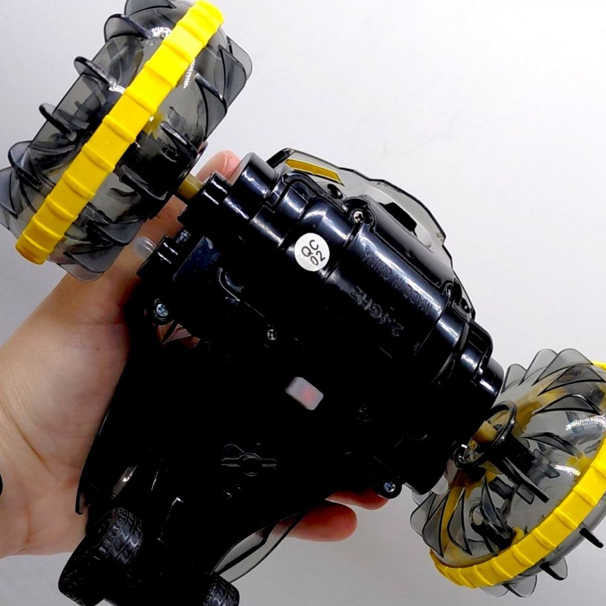 Машина на радіокеруванні 2 види, амфібія, акумулятор: 3. 7 V, пульт: 2. 4 GHz, браслет, підсвічування, перевертиш, режим демонстрації, в коробці (ФІОЛЕТОВИЙ)  фото 4