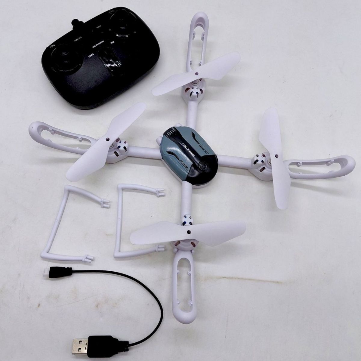 Квадрокоптер Y 22(18) съемный аккумулятор 3. 7V, пульт 2. 4 GHz, USB-кабель, headless mode, подсветка, режимы подсветки, в коробке  фото 4