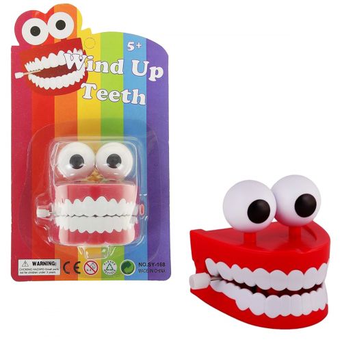 Заводна іграшка "Зуби з очима" фото
