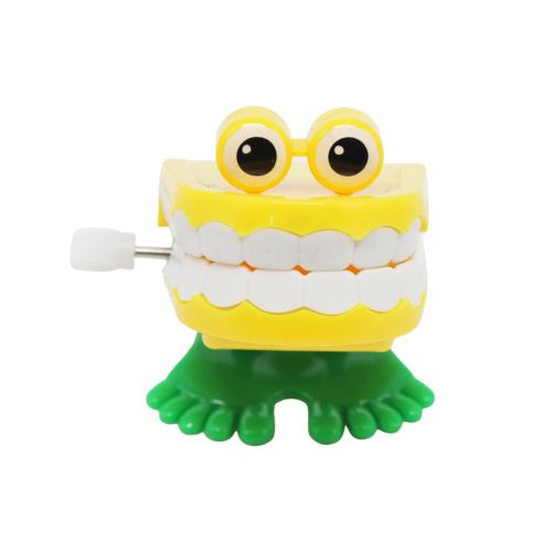 Заводна іграшка "Зуби", жовті фото