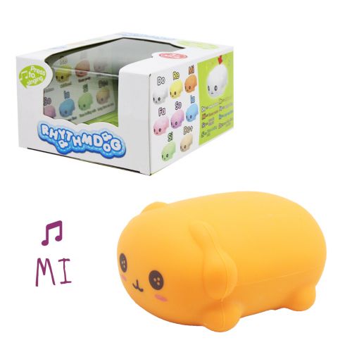 Музыкальная игрушка "Песик", оранжевий фото