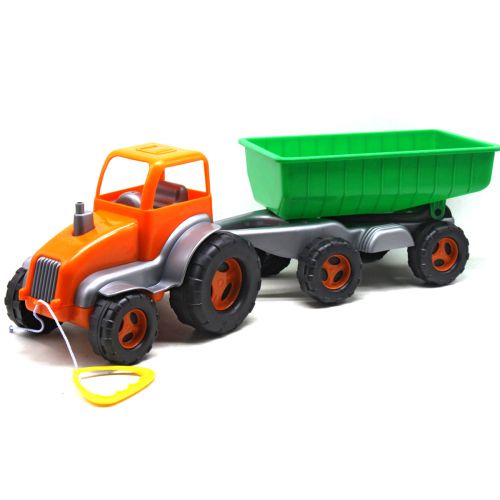Трактор с прицепом оранжево-зеленый фото