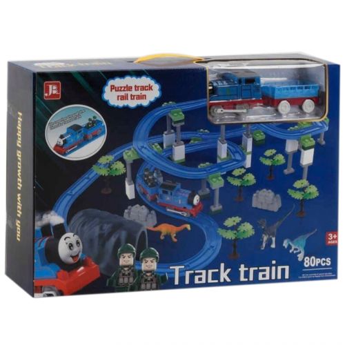 Залізниця 599-28 A на батарейках, 80 деталей, локомотив, вагон, 2 фігурки, 3 динозаври, декорації, аксесуари, звук, в коробці фото
