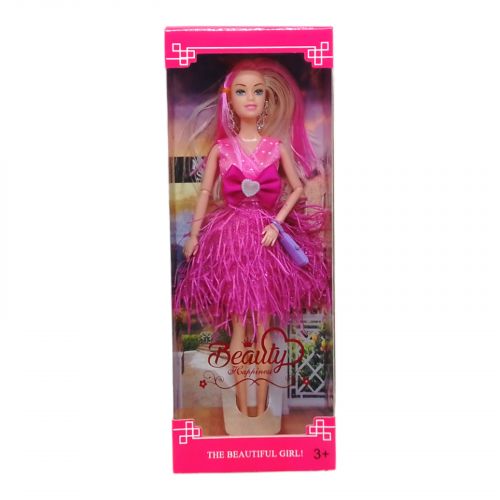 Лялька в рожевій сукні фото
